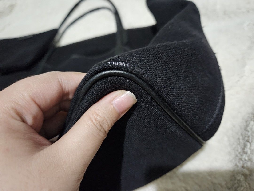 Maison Givenchy Antigona Cotton Tote Bag (Category: Luxury Bags & Wallets) located in Taytay. Submitted by eiohjmrf (Listing ID 1301060588, Image 3). Description: Maison Givenchy Antigona Cotton Tote Bag Has a pouch included with stain. scuffings on bottom corners of the bag. Handle has scuffed pipings on inner sides but not noticeable when worn. Bought from Japanluxxsale on IG..