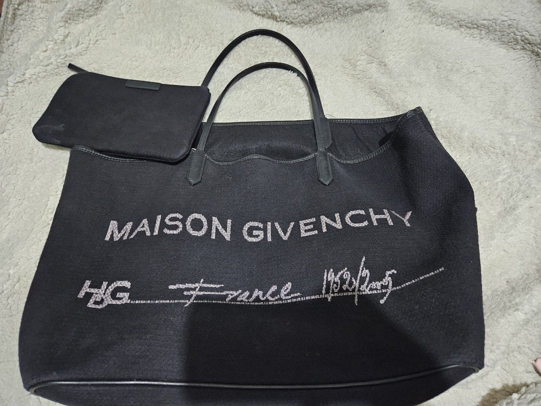 Maison Givenchy Antigona Cotton Tote Bag (Category: Luxury Bags & Wallets) located in Taytay. Submitted by eiohjmrf (Listing ID 1301060588, Image 1). Description: Maison Givenchy Antigona Cotton Tote Bag Has a pouch included with stain. scuffings on bottom corners of the bag. Handle has scuffed pipings on inner sides but not noticeable when worn. Bought from Japanluxxsale on IG..