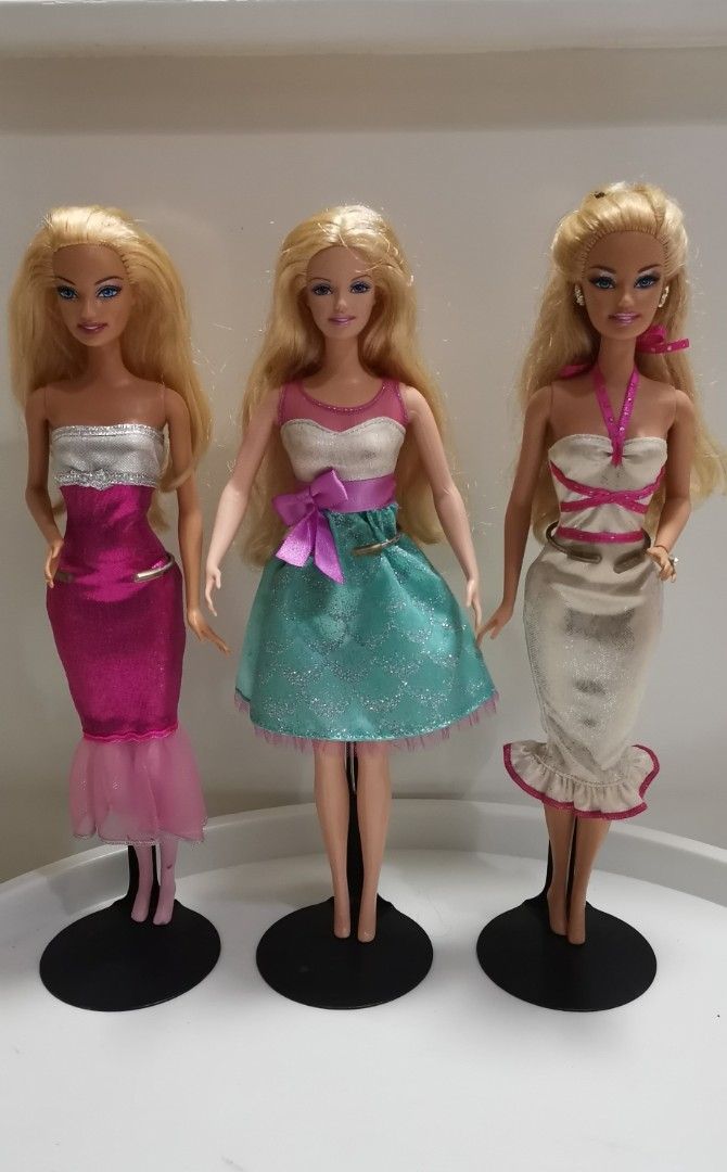 Preloved Vintage 90's Barbie dolls. (Category: Kids Toys) located in Quezon City. Submitted by elliedeclutter (Listing ID 1301068231, Image 1). Description: 1,100.00 each Middle one is already sold..