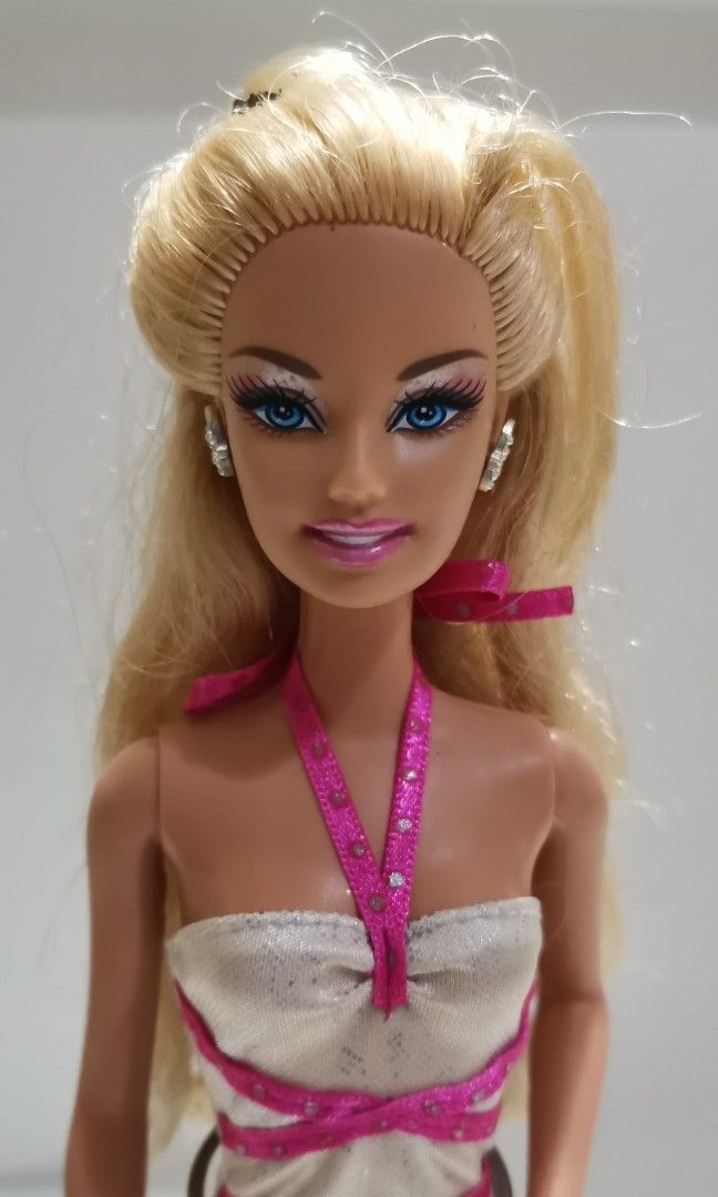 Preloved Vintage 90's Barbie dolls. (Category: Kids Toys) located in Quezon City. Submitted by elliedeclutter (Listing ID 1301068231, Image 2). Description: 1,100.00 each Middle one is already sold..