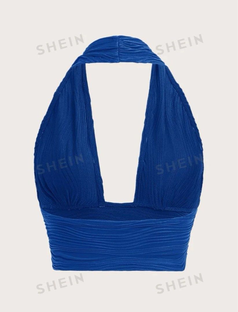 SHEIN Icon Solid Backless Crop Top (Category: Sleeveless) located in San Pedro. Submitted by user73621 (Listing ID 1301042823, Image 1). Description: Never been used Buyer should shoulder the delivery fee.
