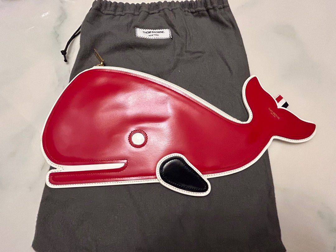 Very unique! Thom Browne whale-shaped punch. Blue and Red color on each  side, 名牌, 手袋及銀包- Carousell