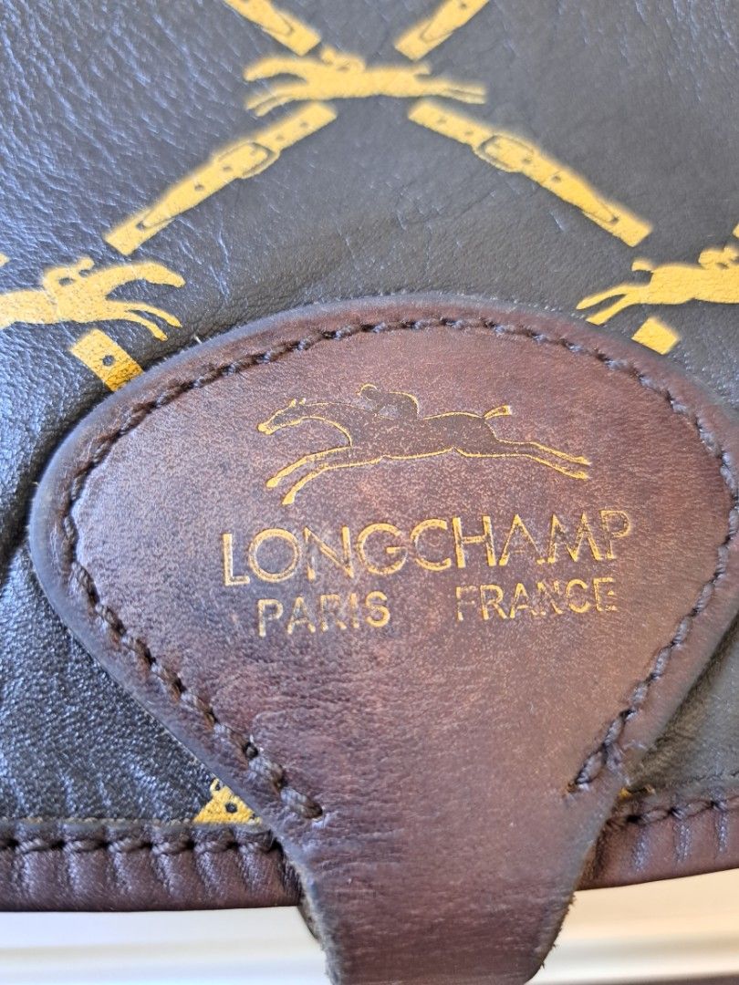 Vintage Longchamp Saddle Bag (Category: Luxury Bags & Wallets) located in Imus. Submitted by blessedbiz (Listing ID 1300999112, Image 2). Description: Authentic and rare Longchamp with 1980's Horse logo Napa Leather..Made in France Clean inside and out. Super minor rubs on leather. Normal signs usage of vintage bag.. Still useable :) RFS: Decluttering, in pursuit for a minimalist life.