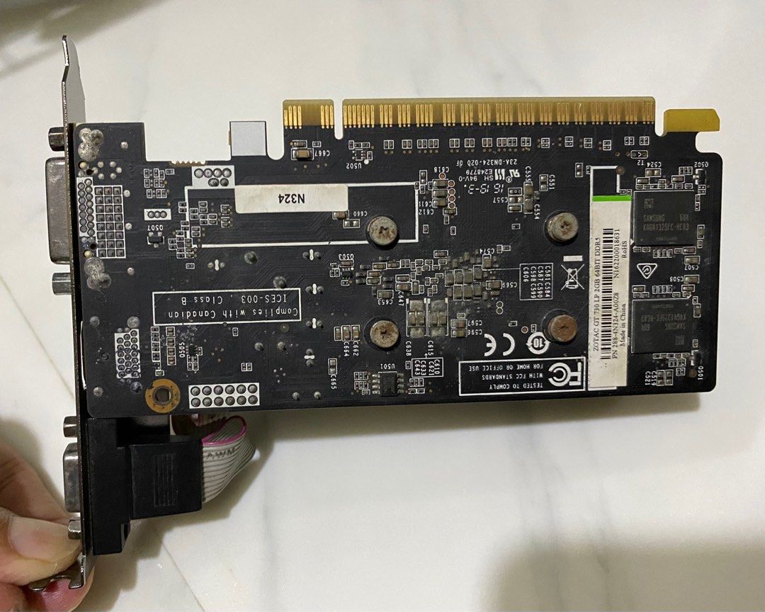Zotac Graphics Card (Category: Computer Parts) located in Imus. Submitted by nhelsg2 (Listing ID 1300965025, Image 2). Description: [Zotac] GeForce GT 730 2GB DDR5 Specifications: GPU: GeForce GT 730, CUDA cores: 384 Video Memory: 2GB DDR5, Memory Bus: 64-bit Engine Clock: 902 Mhz, Memory Clock: 5010 MHz PCI Express: 2.0, Display Outputs: DL-DVI, VGA, HDMI Recommended Power Supply: 300W, Power Consumption: 49W Supported OS: Windows 11 / 10 / 8 / 