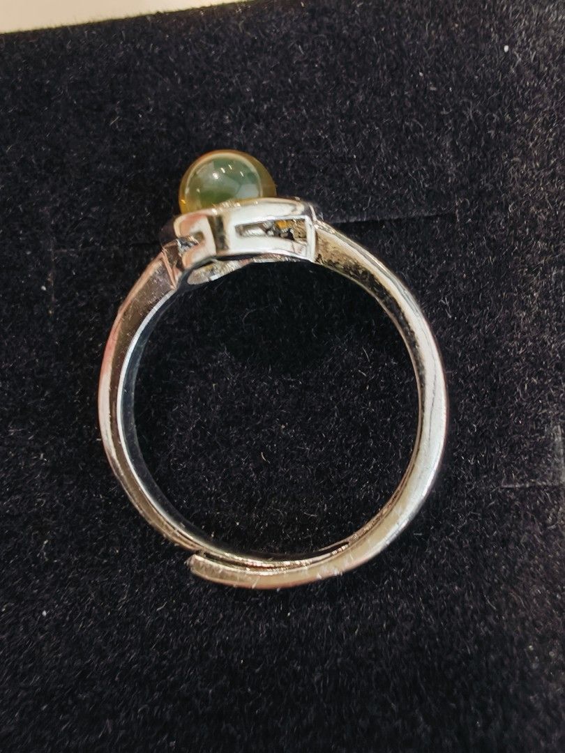 Amber ring (Category: Rings) located in Singapore. Submitted by kittynara (Listing ID 1302575199, Image 3). Description: Natural amber stone ring Authentic stones are more likely to have minor imperfections, like an uneven shape, dips in the surface, or pitting and some inclusions . not for fussy and difficult buyers ! with 925 adjustable ring size suitable as a mother's Day gift girlfriend or friendship gift come with a gift box able to send by 