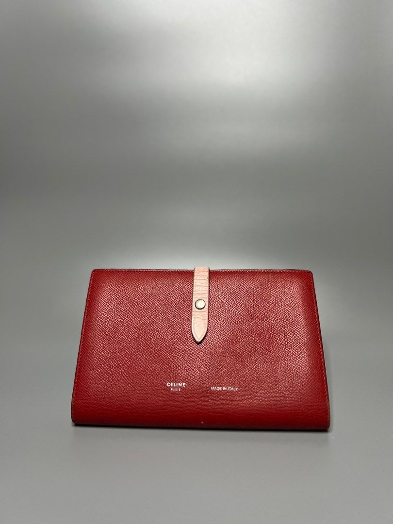 Celine Large Leather Wallet (Category: Luxury Bags & Wallets) located in Manila. Submitted by zapantaesther (Listing ID 1302698448, Image 1). Description: Celine Leather Wallet Large Red/Pink Color Signs of Use on leather strap Minor rubs on corners .