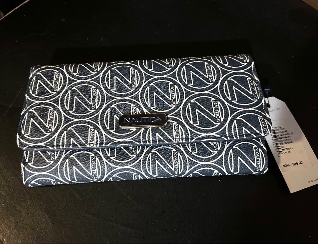 NAUTICA LONG LADIES WALLET (Category: Wallets & Card holders) located in Quezon City. Submitted by mayneyunki (Listing ID 1302719970, Image 1). Description: BRAND NEW NAUTICA LADIES LONG WALLET AUTHENTIC FROM US NO BOX WALLET ONLY. NO DAMAGE, SMOOTH. ORIGINAL PRICE TAG IS STILL ON PIC ESTIMATED PRICE IS 2k Plus. But selling it for only 1K.