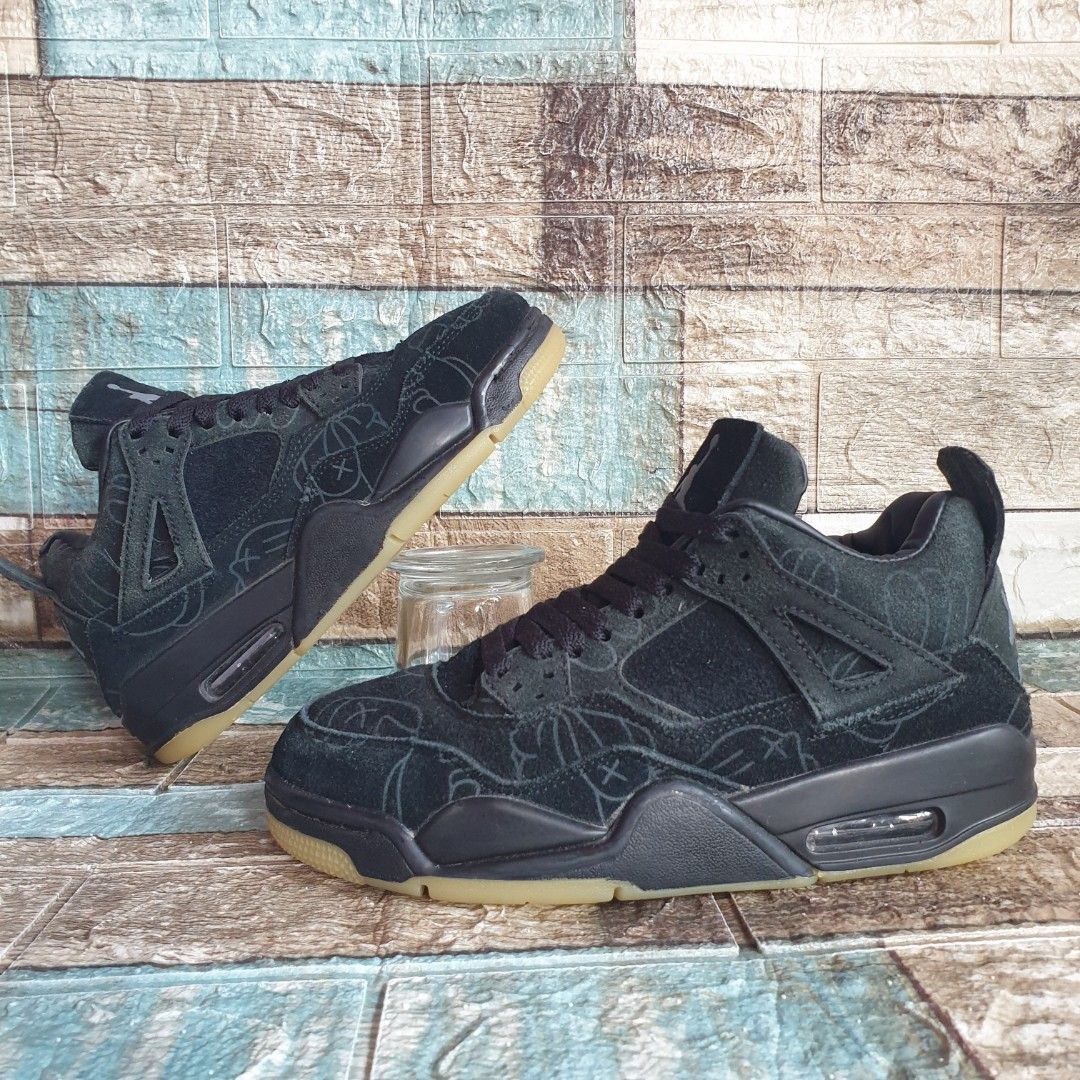 jordan retro 4 kaws black