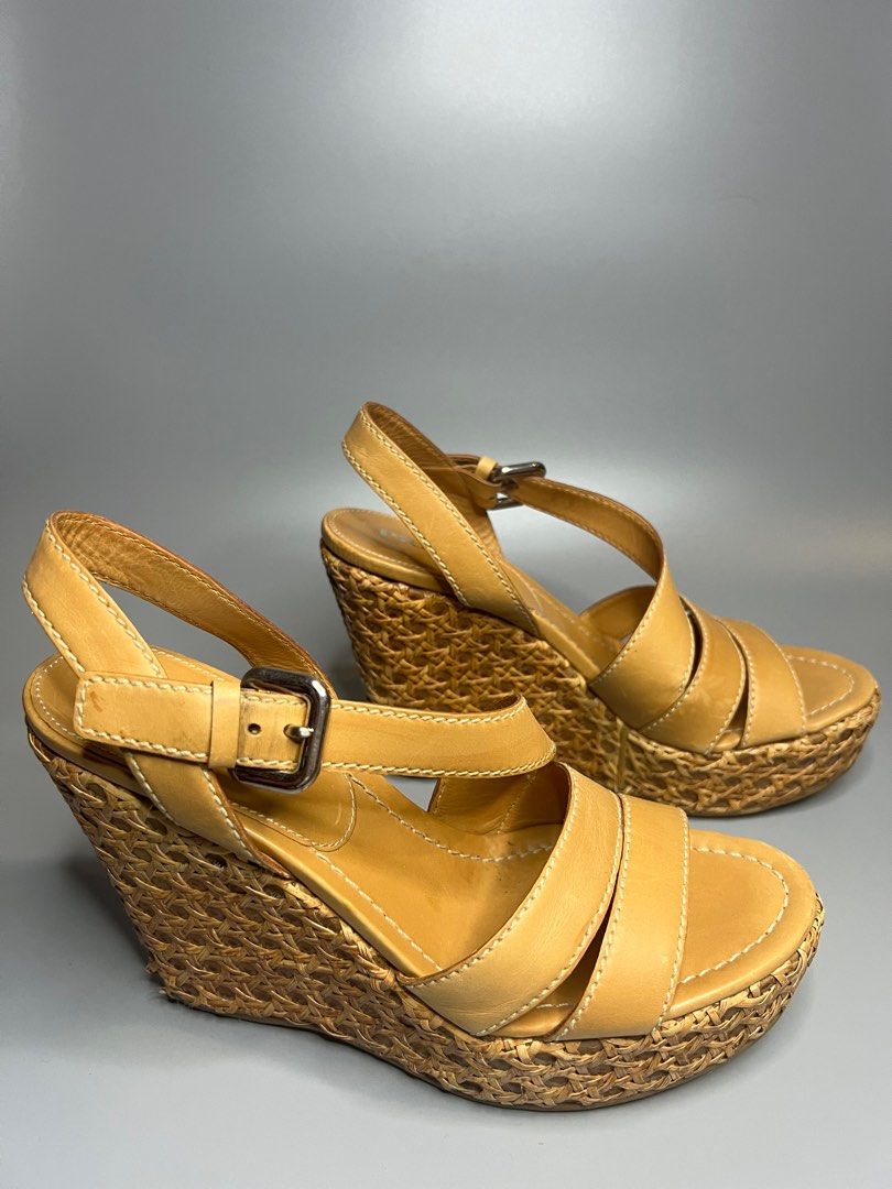Prada Wedge Sandals (Category: Wedges) located in Manila. Submitted by zapantaesther (Listing ID 1302692828, Image 2). Description: Authentic Prada Wedge Issue: Signs of use on heel see photos for reference Still in very good condition No inclusion, provided box only.