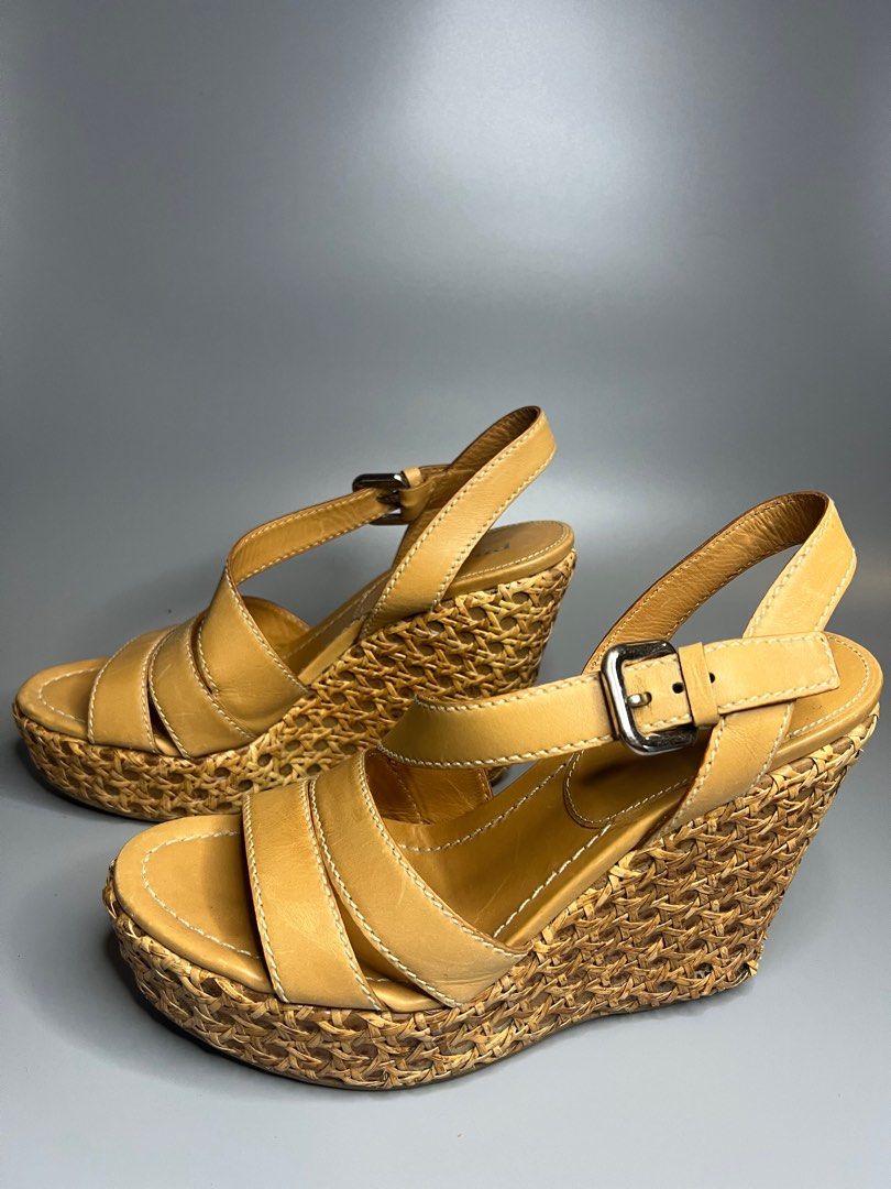 Prada Wedge Sandals (Category: Wedges) located in Manila. Submitted by zapantaesther (Listing ID 1302692828, Image 3). Description: Authentic Prada Wedge Issue: Signs of use on heel see photos for reference Still in very good condition No inclusion, provided box only.