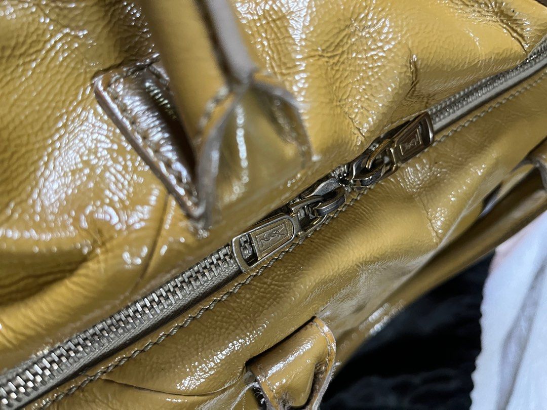 YSL Easy Patent Leather (Category: Luxury Bags & Wallets) located in Paranaque City. Submitted by karpalun (Listing ID 1302656655, Image 3). Description: Mustard / Khaki Length 37cm, Width 16cm, Height 22cm With dust bag and cards.