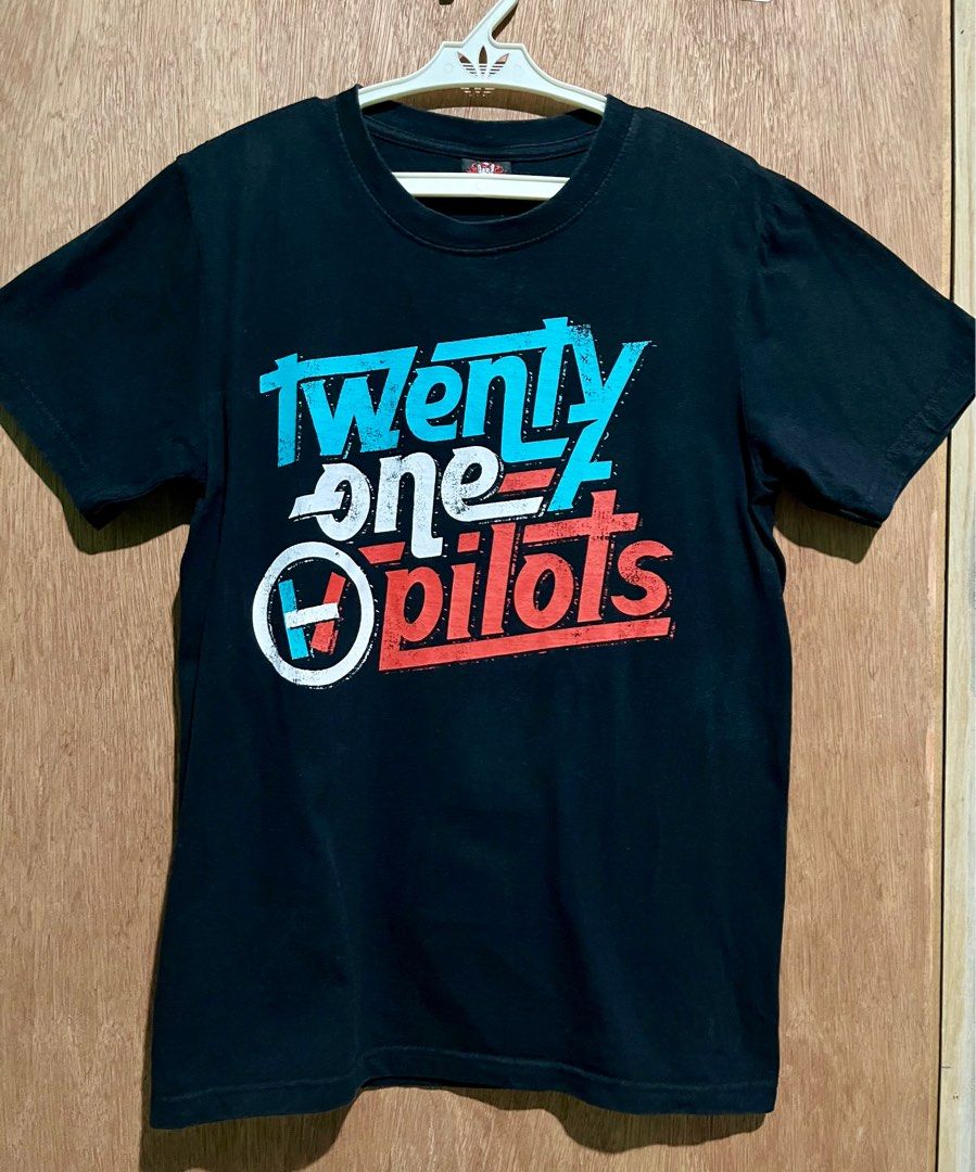 Twenty One pilots Band shirts small size (Category: Shirts) located in Makati City. Submitted by decluttering143 (Listing ID 1302847986, Image 1). Description: Preloved shirts no damage Rfs: my closet is so full no room for formal outfits.