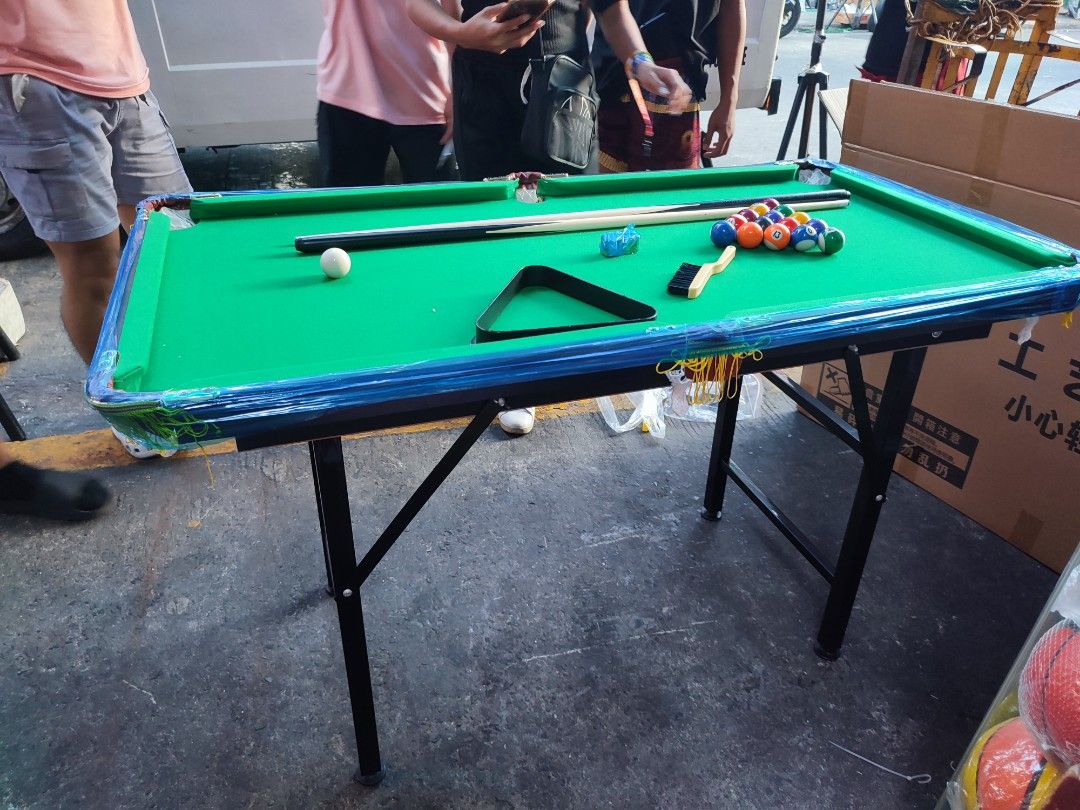 Billiard Table 2 x 4 feet (Junior) (Category: Billiards and Bowling) located in Manila. Submitted by min_yoongi (Listing ID 1302782851, Image 1). Description: Available ✓ JUNIOR BILLIARD TABLE (Foldable) - 2 x 4 feet x 30" Inclusions; - 1 set Ball 1-1/2 - 2 pcs Taco - 1 Triangle - 2 Chalks Pm for inquiries.