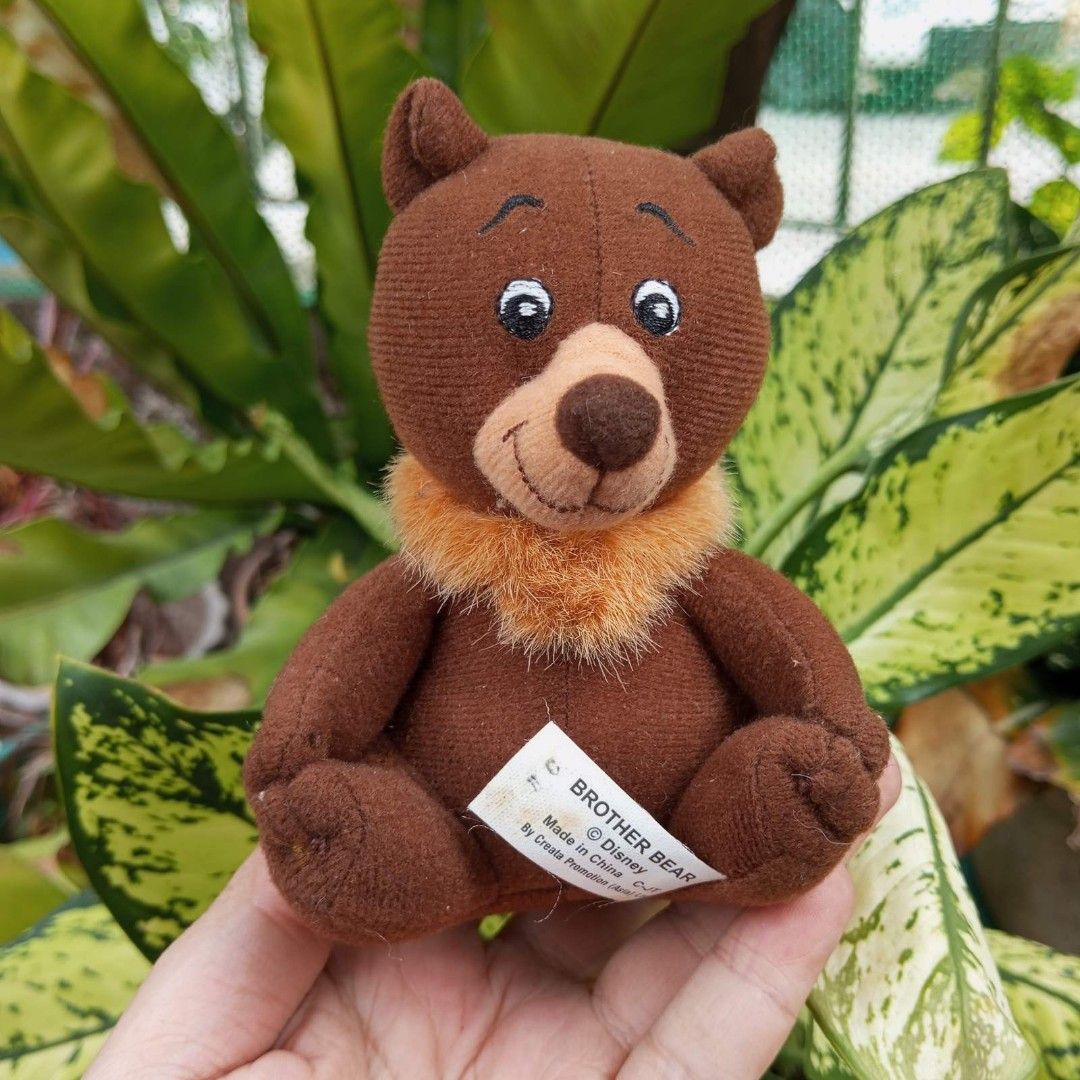 Happy plush toy top