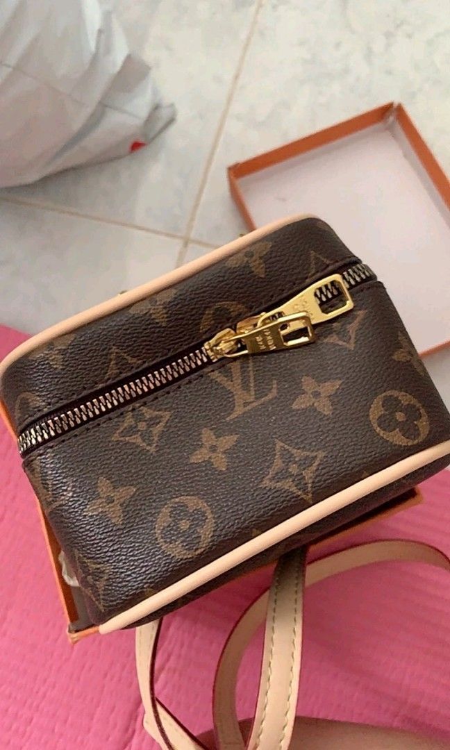 LV VANITY (Category: Luxury Bags & Wallets) located in Manila. Submitted by assortedthingsforsale (Listing ID 1302858765, Image 2). Description: LV VANITY BRAND NEW BUT SALE‼️ SAME AS THE ORIGINAL With sling Flaw is faded the red design on top of the handle (attached photo) Dust bag with receipt (box not included) OPEN FOR SCO/TCO/COD Shoulder by the buyer.