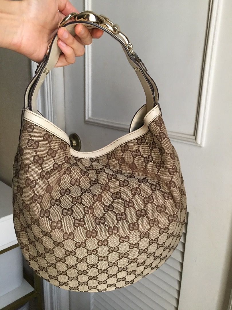 Authentic Gucci GG Canvas Wave Hobo Handbag