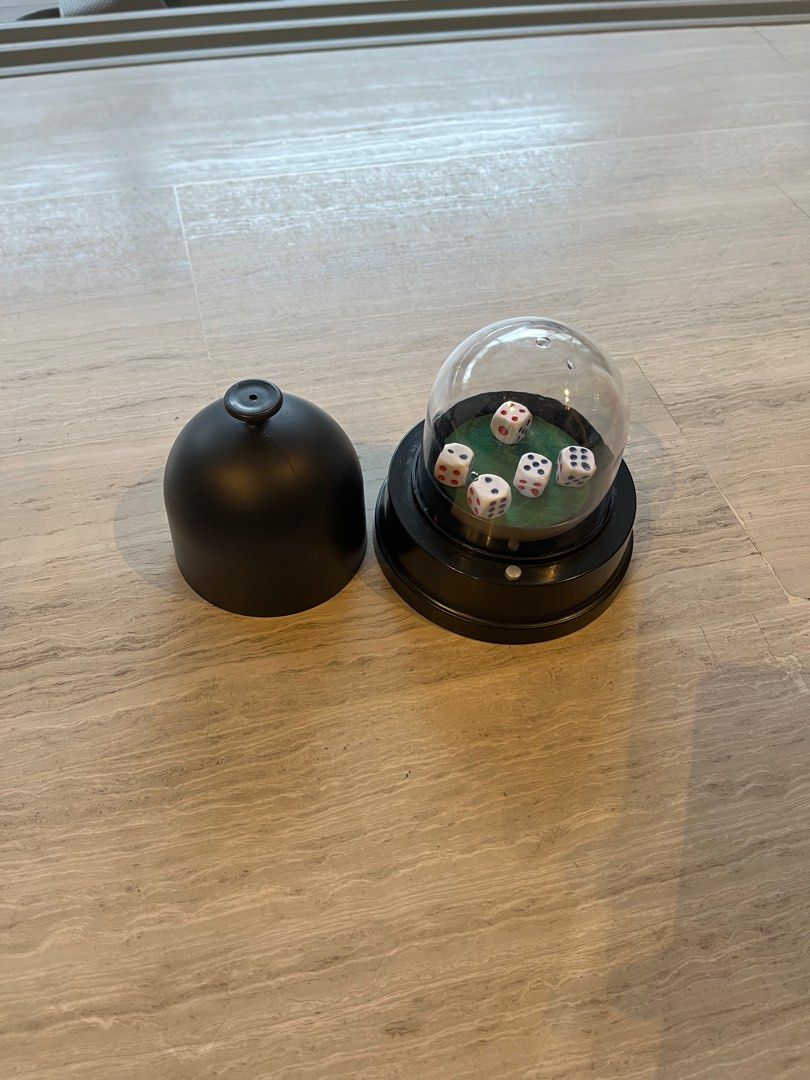 Automatic dice roller (Category: Board Games & Puzzles) located in Singapore. Submitted by karrr98 (Listing ID 1302967494, Image 2). Description: Battery operated dice shaker. Used several times. .
