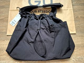 Black GU Drawstring Crossbody Bag Bnew
