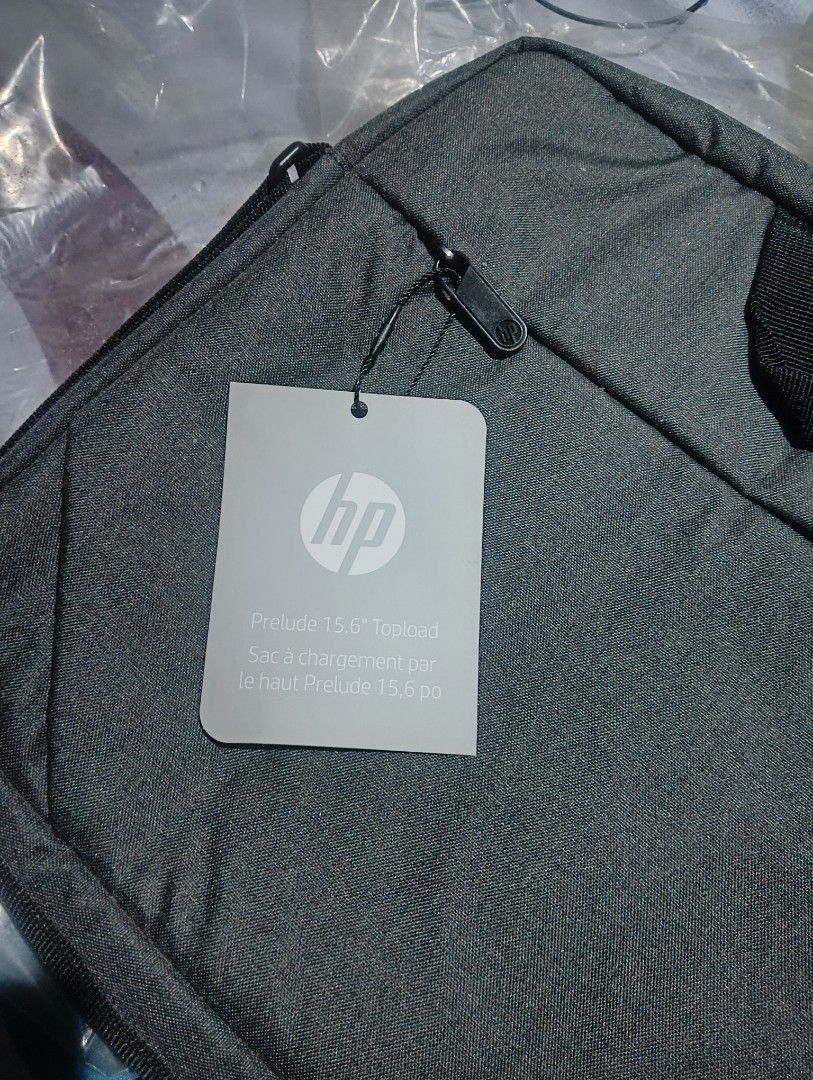 BRAND NEW HP LAPTOP BAG (Category: Laptop Bags & Sleeves) located in Bayambang. Submitted by willespiritu (Listing ID 1262090765, Image 1). Description: HP BRAND NEW LAPTOP BAG BOUGHT FROM OCTAGON COMPUTER STORE. NEVEN BEEN USED, IT WAS ONLY STORED IN THE CABINET. STILL HAVE TAGS AND COVERED IN PLASTIC. RFS: I ALREADY HAVE ONE FROM MY PREVIOUSLY PRUCHASED HP LAPTOP. DECLUTERRING..