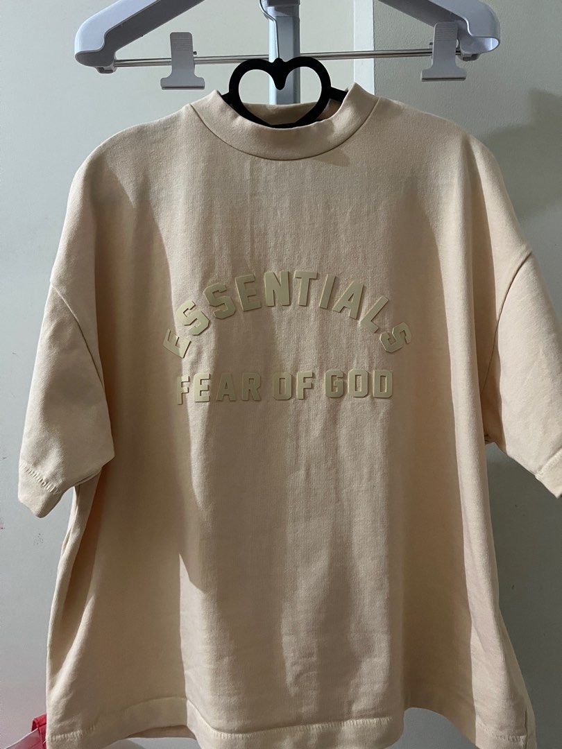 Essentials kids round-neck t-shirt (Category: Shirts) located in Manila. Submitted by anxiousbaker (Listing ID 1303048665, Image 1). Description: - see size chart in the listing - size is 14/16 - XXL in Western Kids sizing so in Asian women it can fit up to medium (baggy fit) and large (mej baggy na lang) - style is oversized and baggy (like an American football jersey) laglag balikat - used twice - bought from Commonwealth in Rockwell - RFS: dec