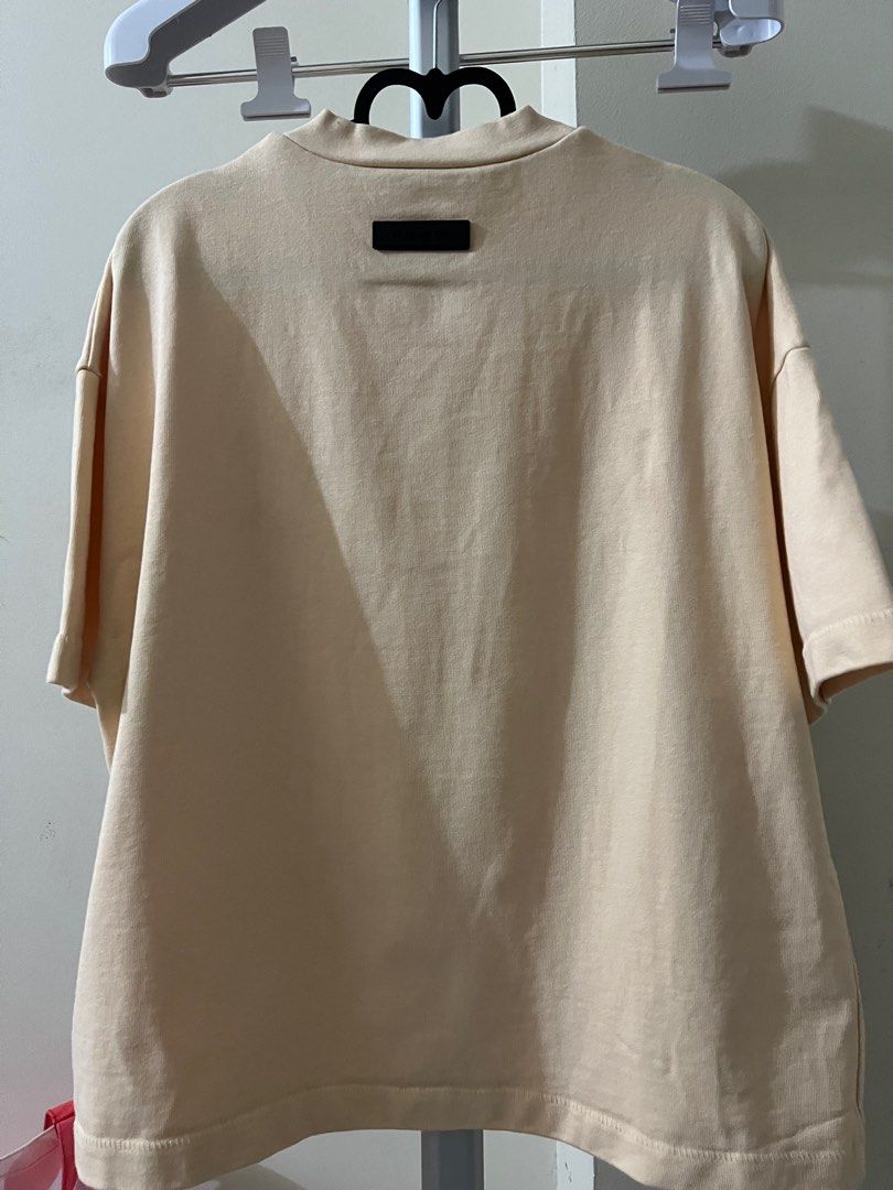 Essentials kids round-neck t-shirt (Category: Shirts) located in Manila. Submitted by anxiousbaker (Listing ID 1303048665, Image 2). Description: - see size chart in the listing - size is 14/16 - XXL in Western Kids sizing so in Asian women it can fit up to medium (baggy fit) and large (mej baggy na lang) - style is oversized and baggy (like an American football jersey) laglag balikat - used twice - bought from Commonwealth in Rockwell - RFS: dec