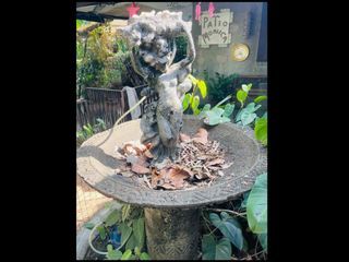Garden water fountain with lady sculpture