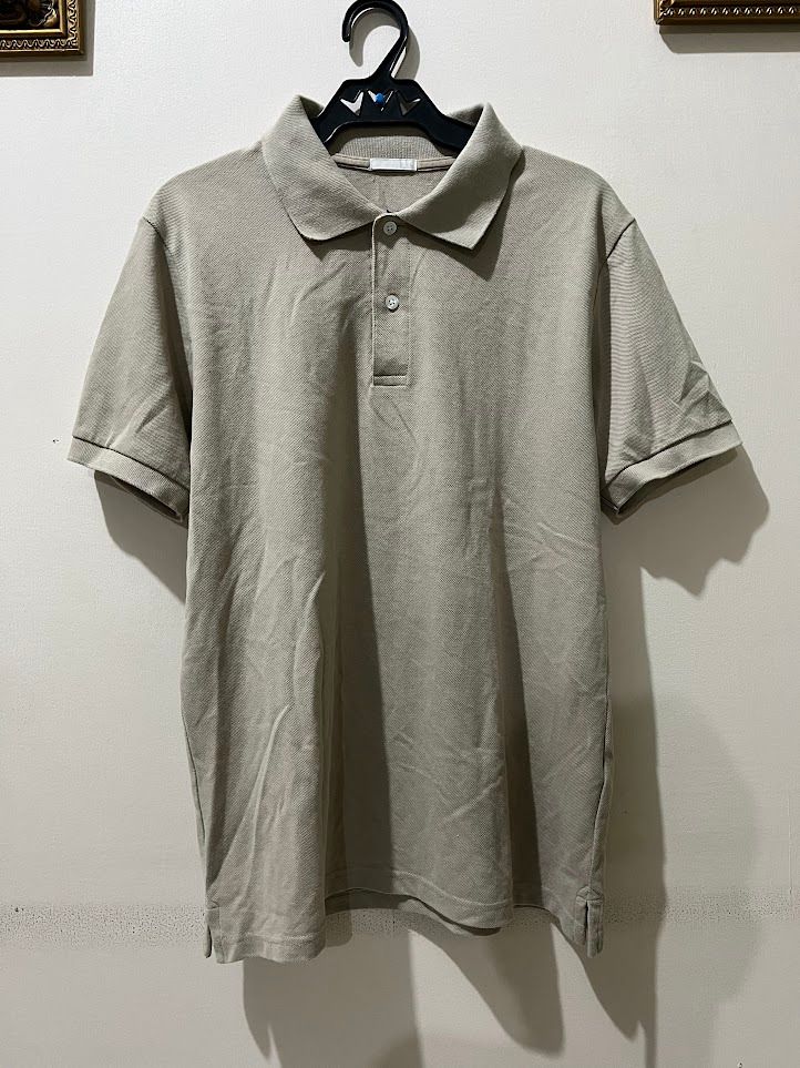 GU Polo Shirt (Category: Tshirts & Polo Shirts ) located in Manila. Submitted by wellnessessentials (Listing ID 1303038844, Image 1). Description: GU Khaki Polo Shirt Size Large 19.5" width 27" length GU Uniqlo.