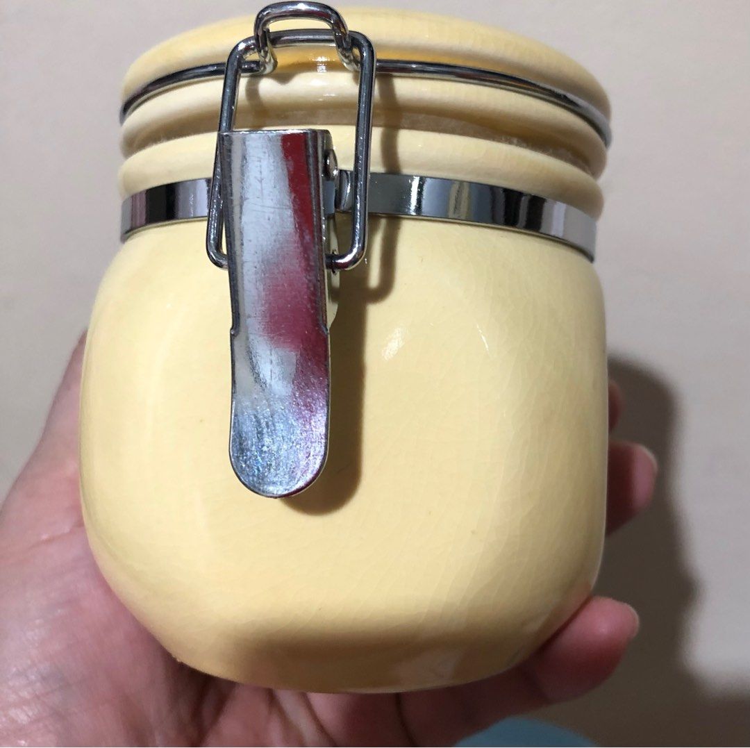JAPAN CONDIMENT CERAMIC CONTAINERS 2’s (Category: Food Organization & Storage) located in Caloocan City. Submitted by e_o62059 (Listing ID 1303074427, Image 2). Description: Japan branded brand new in original box; pristine condition;w/rubber lid (airtight ) Size- 3.2in x 3.2in x 3.75in.