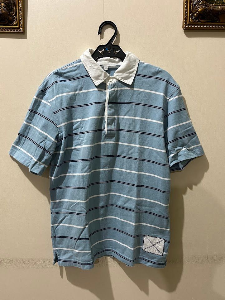 Uniqlo Polo Shirt (Category: Tshirts & Polo Shirts ) located in Manila. Submitted by wellnessessentials (Listing ID 1303040864, Image 1). Description: Uniqlo Polo Shirt Size Medium 19" width 26.5"-27" length.