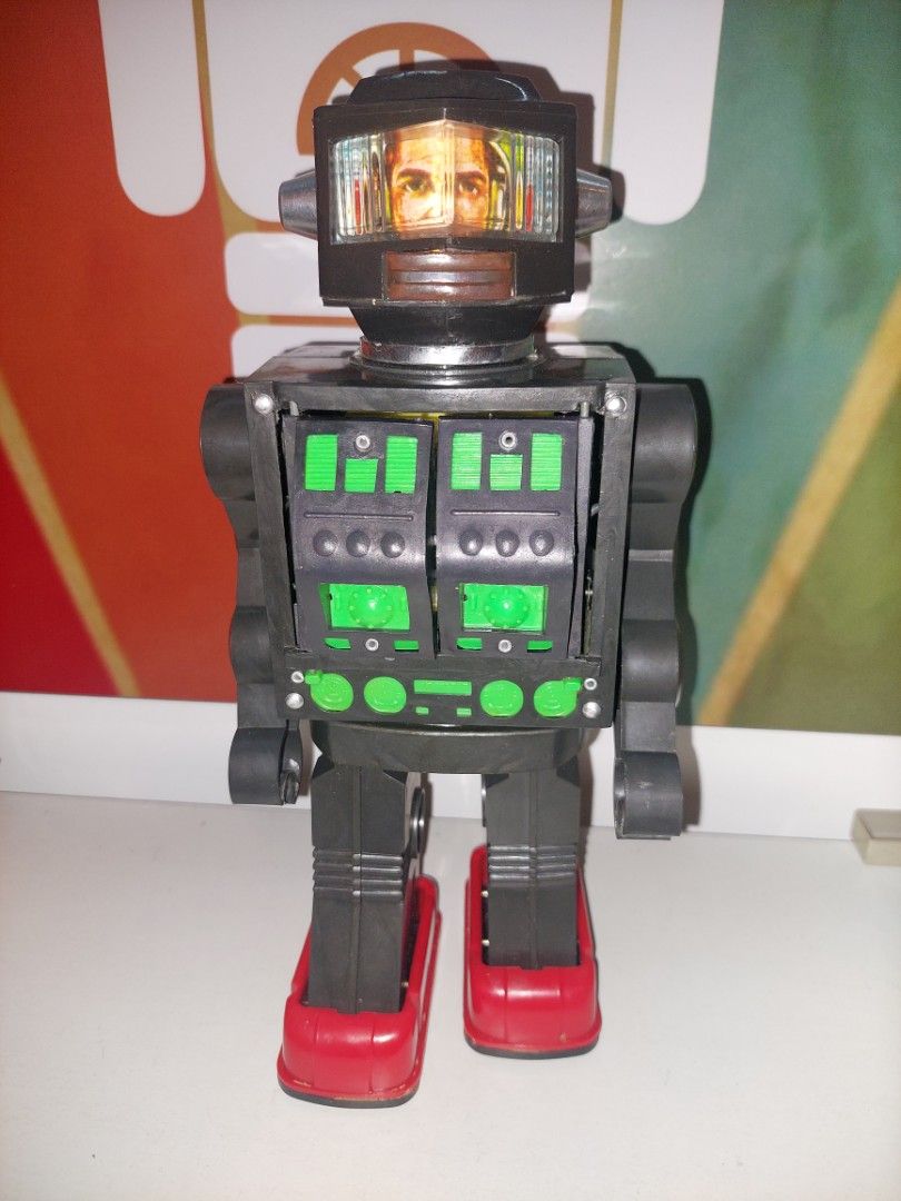 Vintage battery operated robots (Category: Interactive Toys) located in Manila. Submitted by retrotoycollections (Listing ID 1302923595, Image 3). Description: red japan fully working 10k blue japan w box fully working 15k black with face hong kong light and sound only 6k last pic 4k each or 11k all 3.