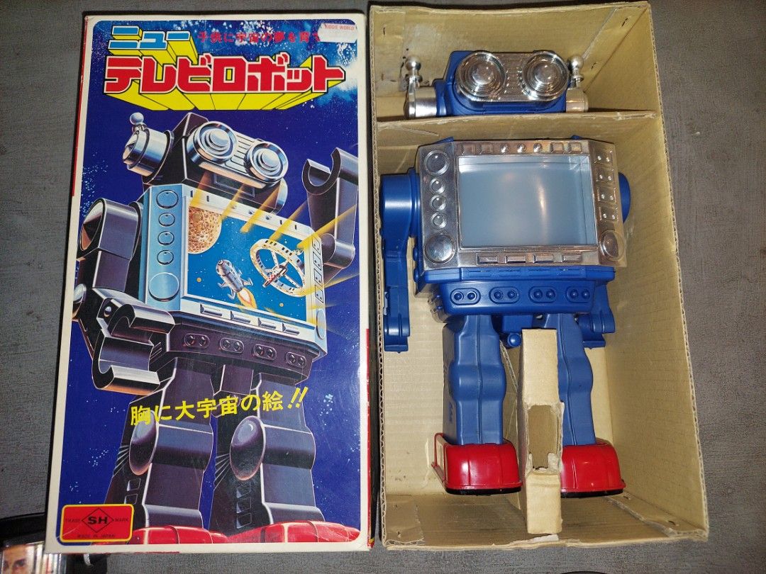 Vintage battery operated robots (Category: Interactive Toys) located in Manila. Submitted by retrotoycollections (Listing ID 1302923595, Image 2). Description: red japan fully working 10k blue japan w box fully working 15k black with face hong kong light and sound only 6k last pic 4k each or 11k all 3.