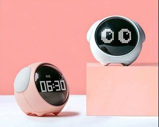80% off. Peach Pixel Emoticon Alarm Clock. (No box)