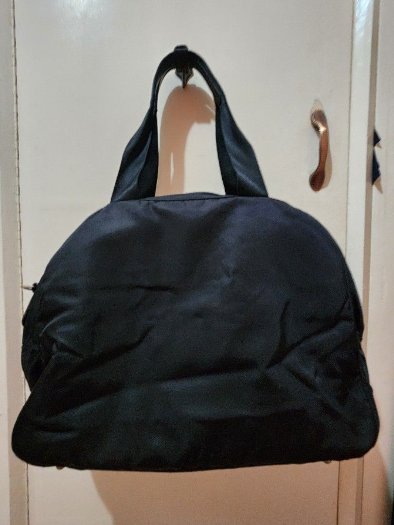 Agnes B. Travel Bag or Duffle Bag (Category: Luxury Bags & Wallets) located in Batangas. Submitted by mberrz (Listing ID 1303121763, Image 2). Description: Agnes B. duffle bag perfect for travelling lots of pockets, zippers are great, no loose stitches superb condition! see other photos for price comparison abroad (1800hkd = 13k php/ 2680twd = 4k php) issues: lost body bag strap and padlock accessory rfs: i prefer backpacks for travelling now.