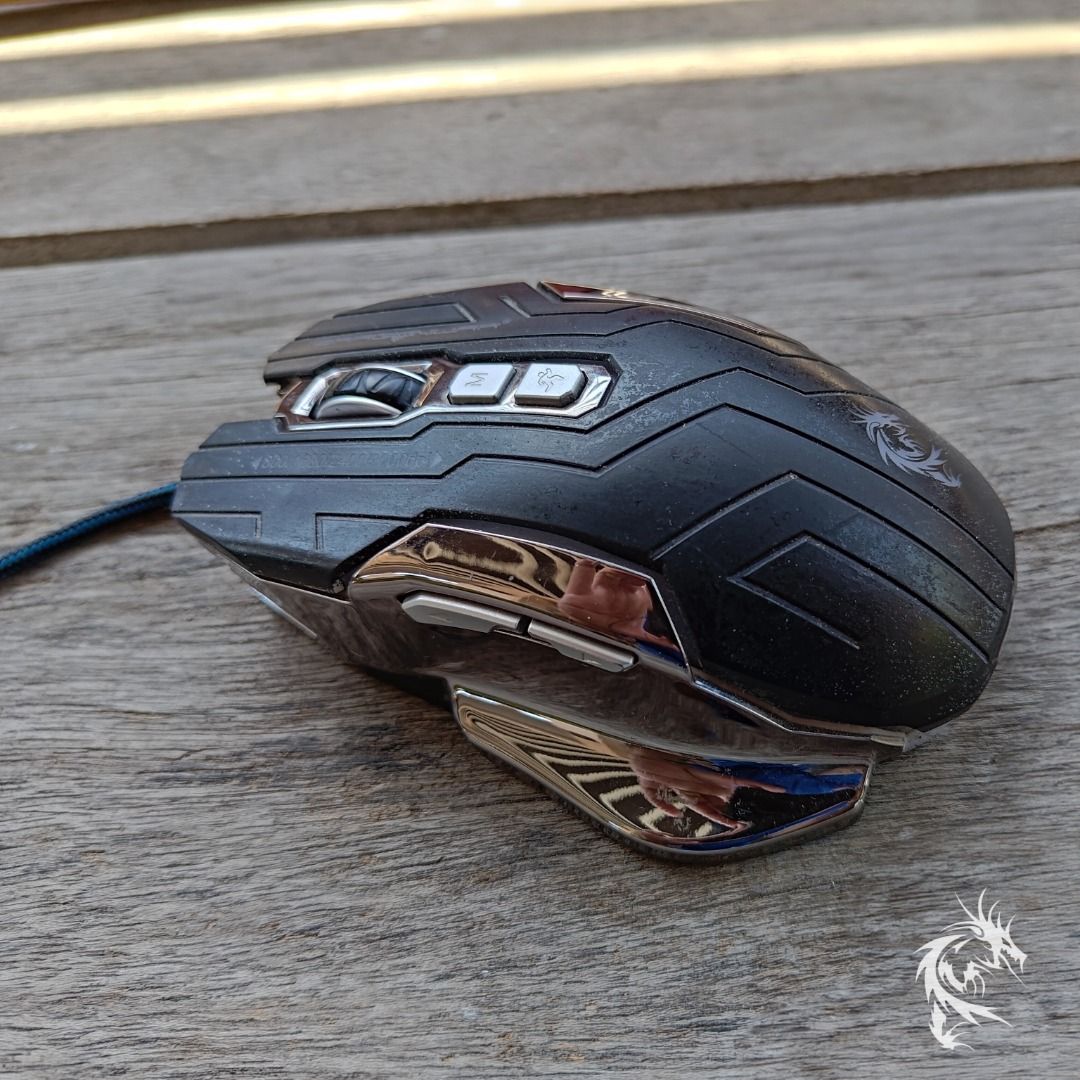 Dragonwar Gaming Mouse ELE-G12 Black (Category: Mouse & Mousepads) located in Manila. Submitted by dregzerp (Listing ID 1303205712, Image 3). Description: Heavily used but still working great. Install the Dragonwar application to change LED color and light pattern. Programmable keys. RFS: Decluttering No meetups. Ship only via J&T / LBC. Shipping fee will be shouldered by buyer..