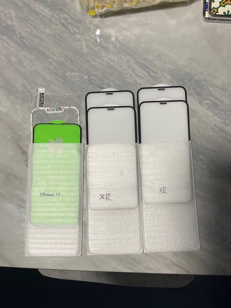 iPhone Screen protector (Category: Other Mobile & Gadget Accessories) located in Singapore. Submitted by walkingaroundseesee (Listing ID 1303117474, Image 1). Description: iPhone 13 (3) iPhone XR (4) Screen protector available Price: $5 each .