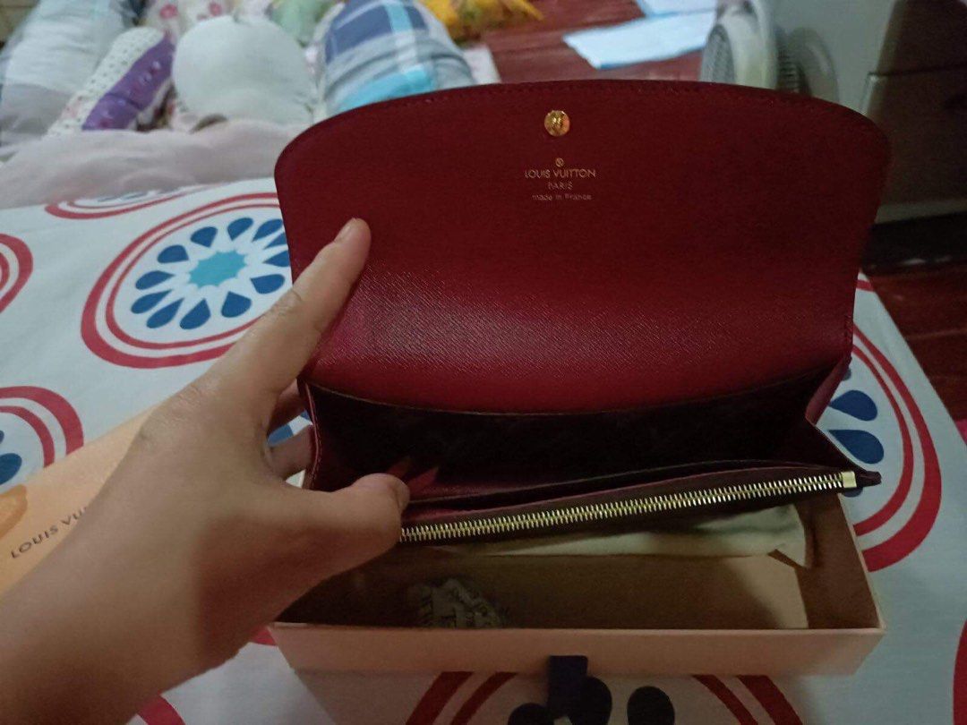 Louis Vuittion Emilie Wallet (Category: Luxury Bags & Wallets) located in Paranaque City. Submitted by alymae27 (Listing ID 1303206290, Image 3). Description: Brand new. Inclusions: box, paperbag, card. Free LV perfume..