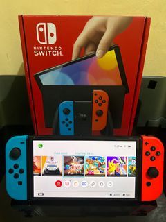 Nintendo switch Oled with Games R/B