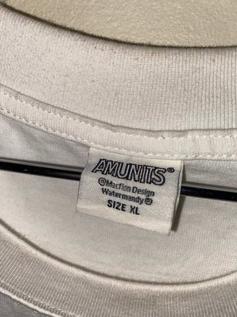 AMUNITS White Shirt Mens (XL) (Category: Tshirts & Polo Shirts ) located in Taytay. Submitted by rotation_exit (Listing ID 1303340580, Image 2). Description: best fit: XL issue: none dimensions: 21.5x28” sleeve length: 9” color rate: 10 mop: gcash (payment first, no cod) mod: j&t / lalamove pin loc: mabaya manila / 33 b pagasa taytay if not responding, please text us.