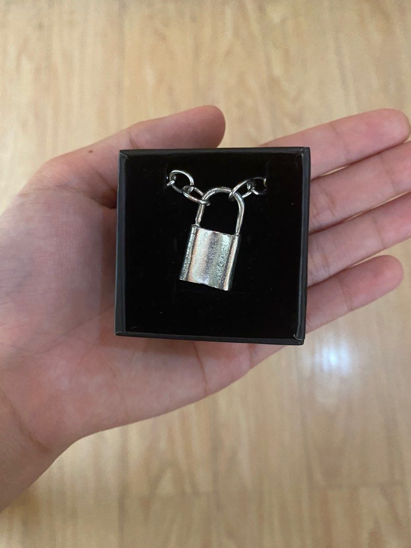 Chains Padlock Necklace (Category: Necklaces) located in Rizal. Submitted by protractor (Listing ID 1303298865, Image 1). Description: L: 10 inches (can be adjusted since the chain has bigger holes to be attached) .