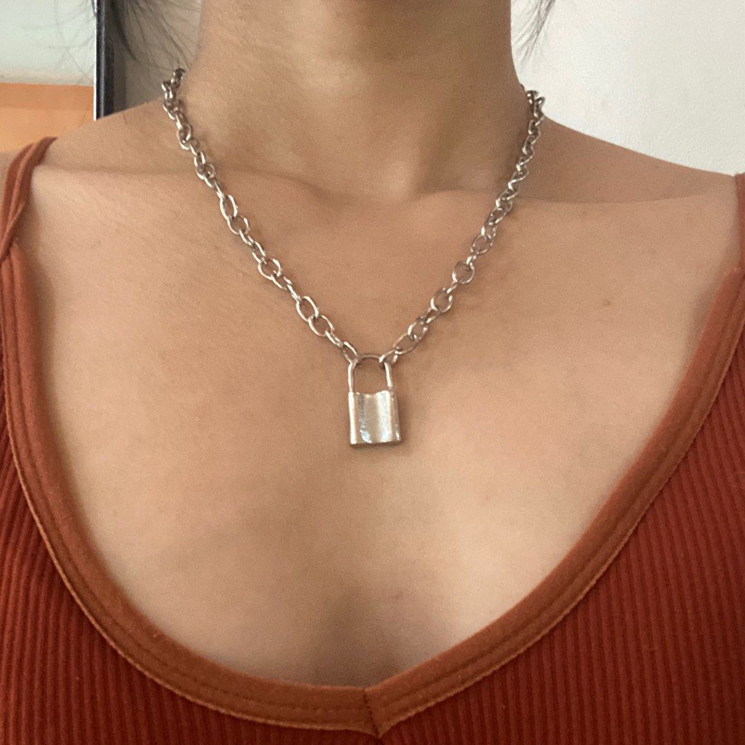 Chains Padlock Necklace (Category: Necklaces) located in Rizal. Submitted by protractor (Listing ID 1303298865, Image 2). Description: L: 10 inches (can be adjusted since the chain has bigger holes to be attached) .