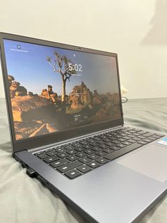 Huawei Matebook D14 BE w/ plantronics headset and other accessories