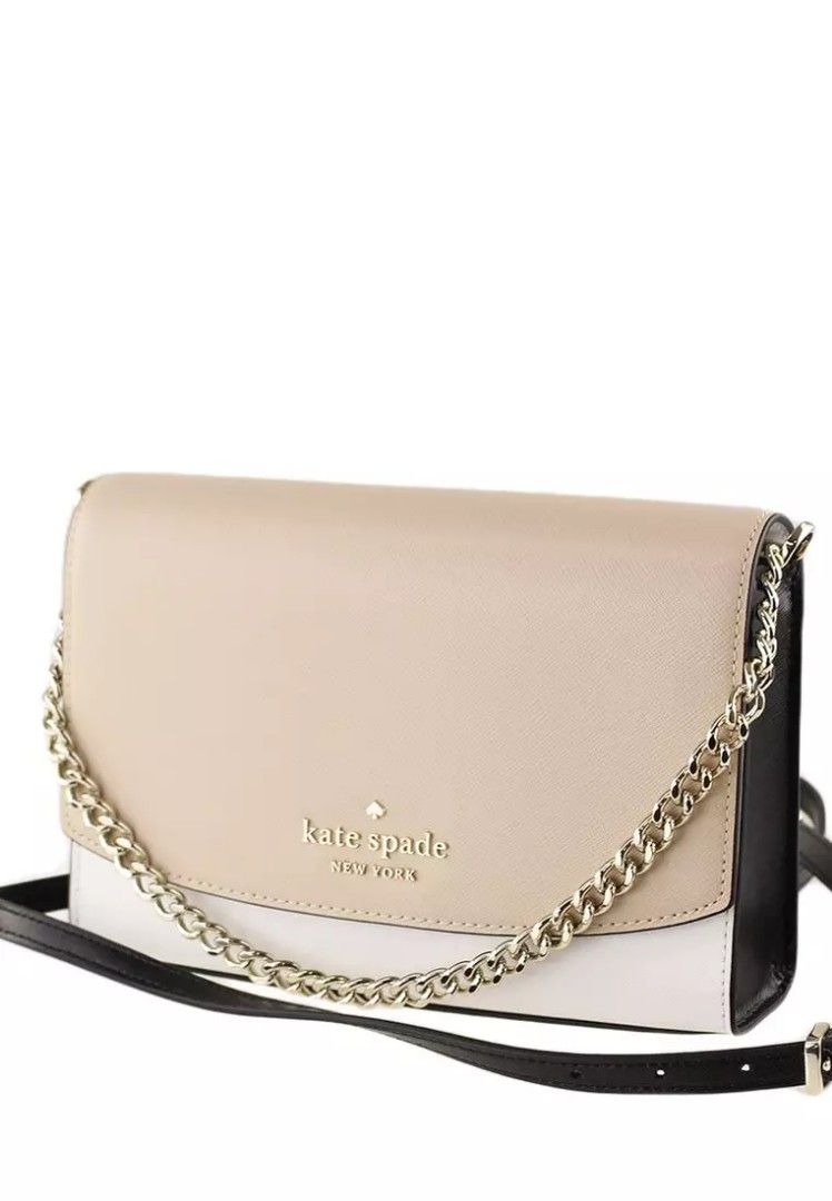Authentic Kate Spade ♠️ Carson from US (Category: Luxury Bags & Wallets) located in Manila. Submitted by abieco1401967 (Listing ID 1303340852, Image 2). Description: 6.87"h x 9.12"w x 2.56"d handle drop: 6.75" strap drop: 22" saffian metal pin mount logo interior: back slip pocket exterior: back slip pocket flap with magnetic snap closure dust bag not included imported Style No. WKR00102 FROM US AUTHENTIC 💯.