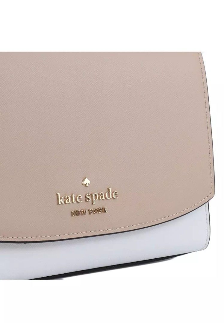 Authentic Kate Spade ♠️ Carson from US (Category: Luxury Bags & Wallets) located in Manila. Submitted by abieco1401967 (Listing ID 1303340852, Image 3). Description: 6.87"h x 9.12"w x 2.56"d handle drop: 6.75" strap drop: 22" saffian metal pin mount logo interior: back slip pocket exterior: back slip pocket flap with magnetic snap closure dust bag not included imported Style No. WKR00102 FROM US AUTHENTIC 💯.