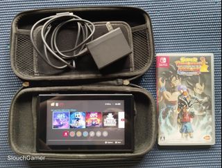 Selling my Nintendo Switch V1 Tablet  with Original charger and dragonball game japanese version.