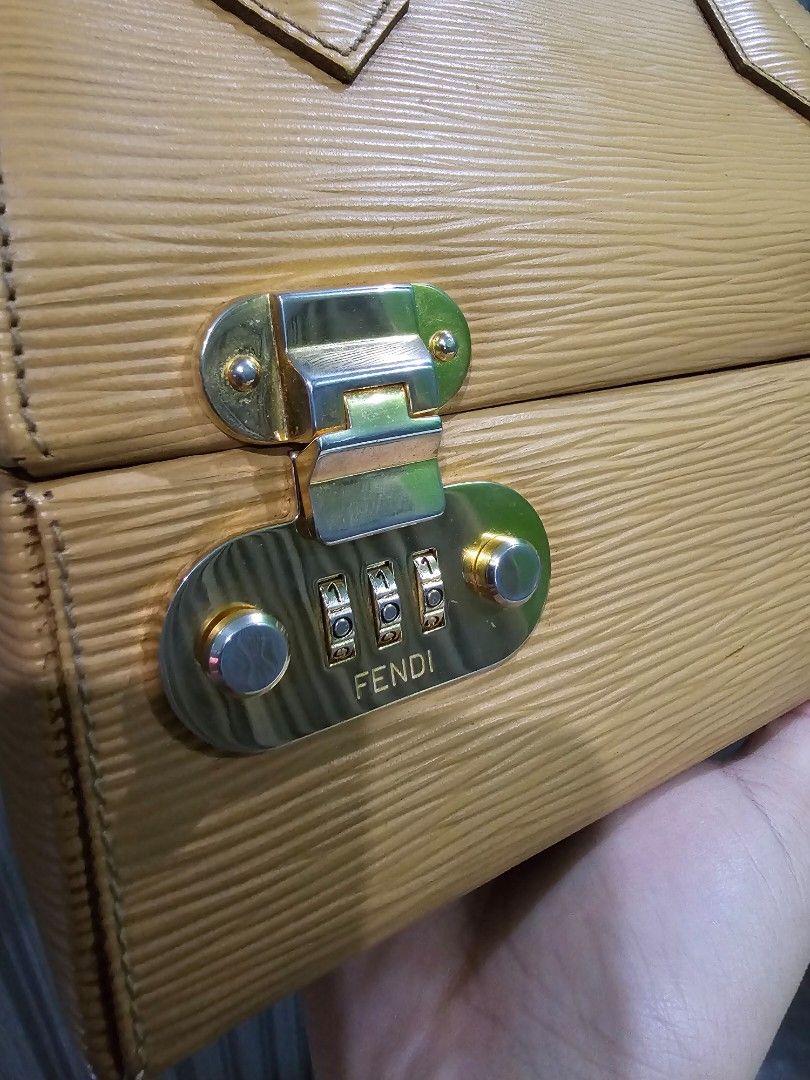 Vintage Fendi Vanity Bag (Category: Luxury Bags & Wallets) located in Tarlac. Submitted by attykrc (Listing ID 1303385628, Image 3). Description: Vintage Fendi Vanity Bag in Epi Leather Very unique bag. Lower part is vanity case with mirror and with code lock (you can store important items). Handbag but you can attach the strap to make it as shoulder bag. Guaranteed authentic..