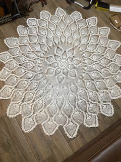 [25]	crocheted white round table cloth 60"