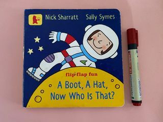 A Boot, A Hat, Now Who is That? (Board Book)