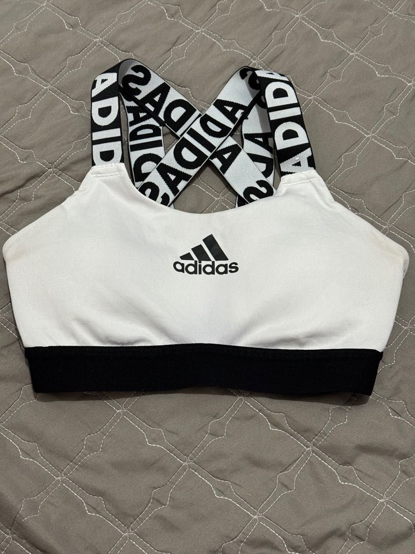 Adidas sports top (Category: Activewear) located in Las Pinas. Submitted by issaprelovedstuff (Listing ID 1303502329, Image 1). Description: Adidas logo sports top Padded With pad slot Size small Bandwidth - 10.5” laid flat.