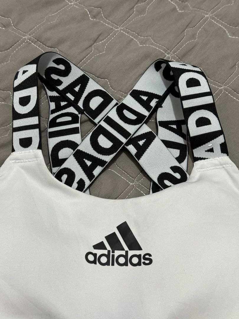 Adidas sports top (Category: Activewear) located in Las Pinas. Submitted by issaprelovedstuff (Listing ID 1303502329, Image 2). Description: Adidas logo sports top Padded With pad slot Size small Bandwidth - 10.5” laid flat.