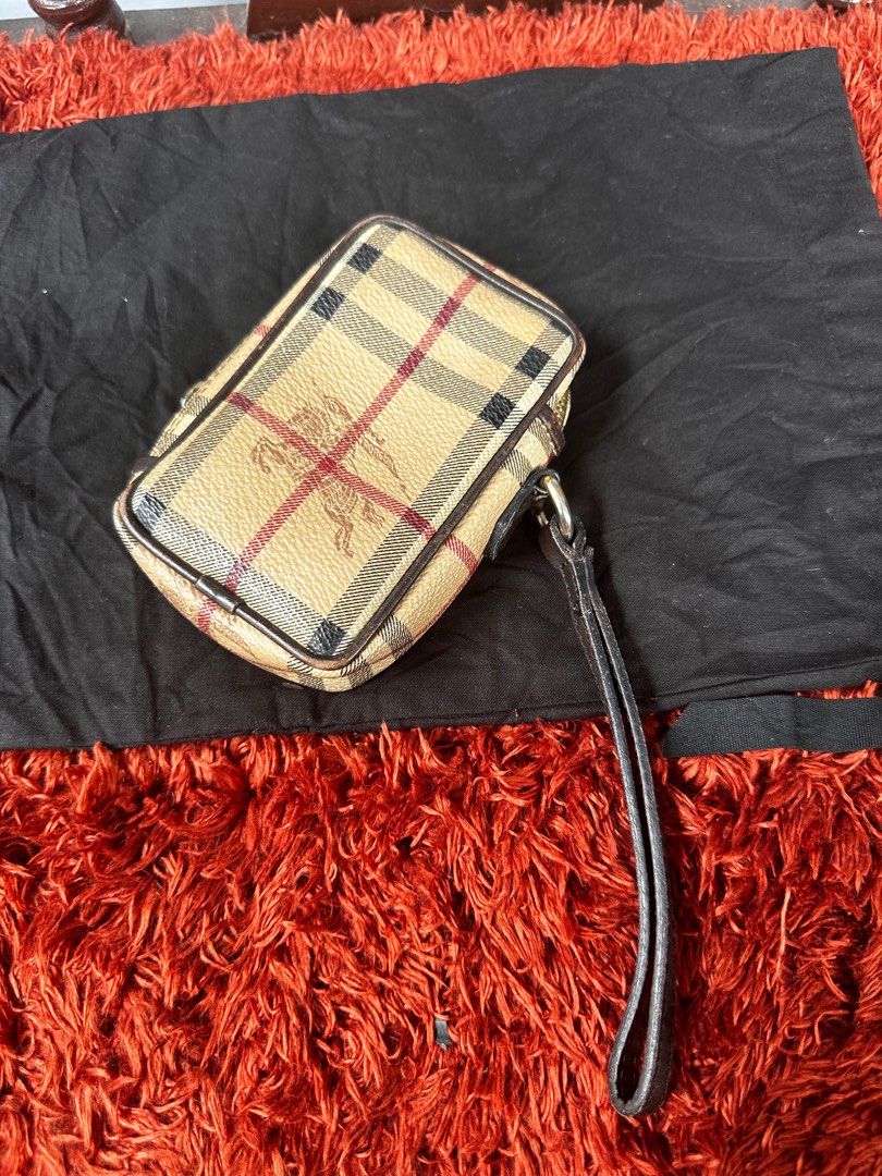 Burberry wristlet pouch Luxury Bags Wallets on Carousell